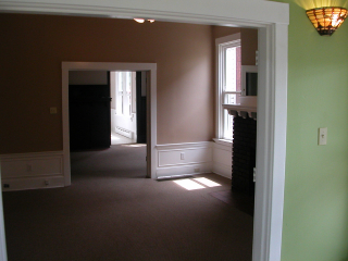 Living Room looking into dining room and kitchen